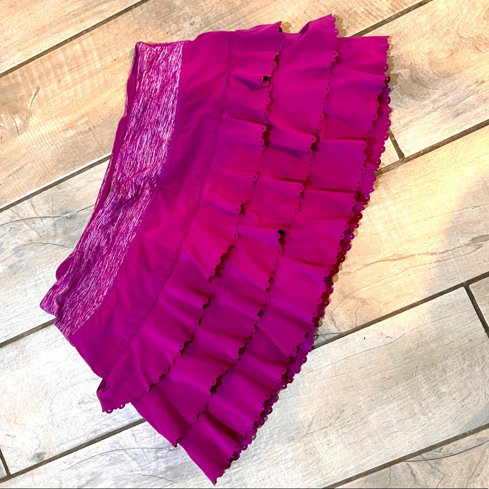 Purple layered ruffle skirt with shorts. Discontinued item